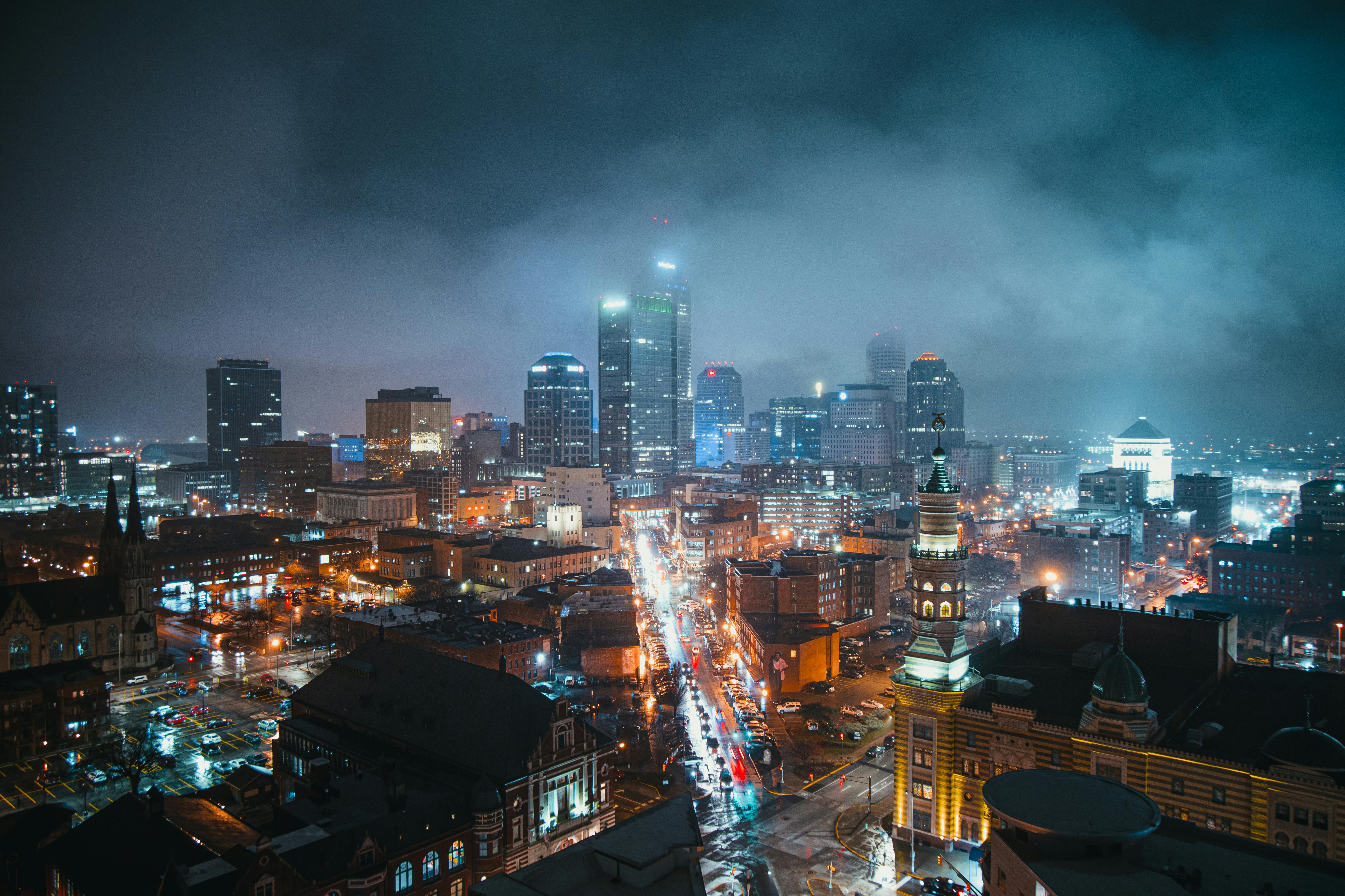 Dynamic city skyline at night with illuminated skyscrapers